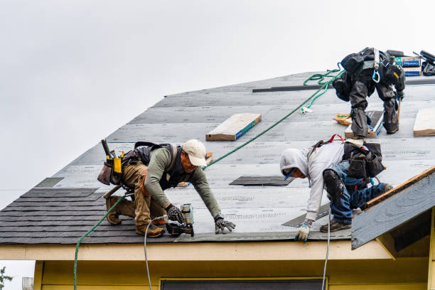 Professional Gutter Installation technician working in Lakeville, CT